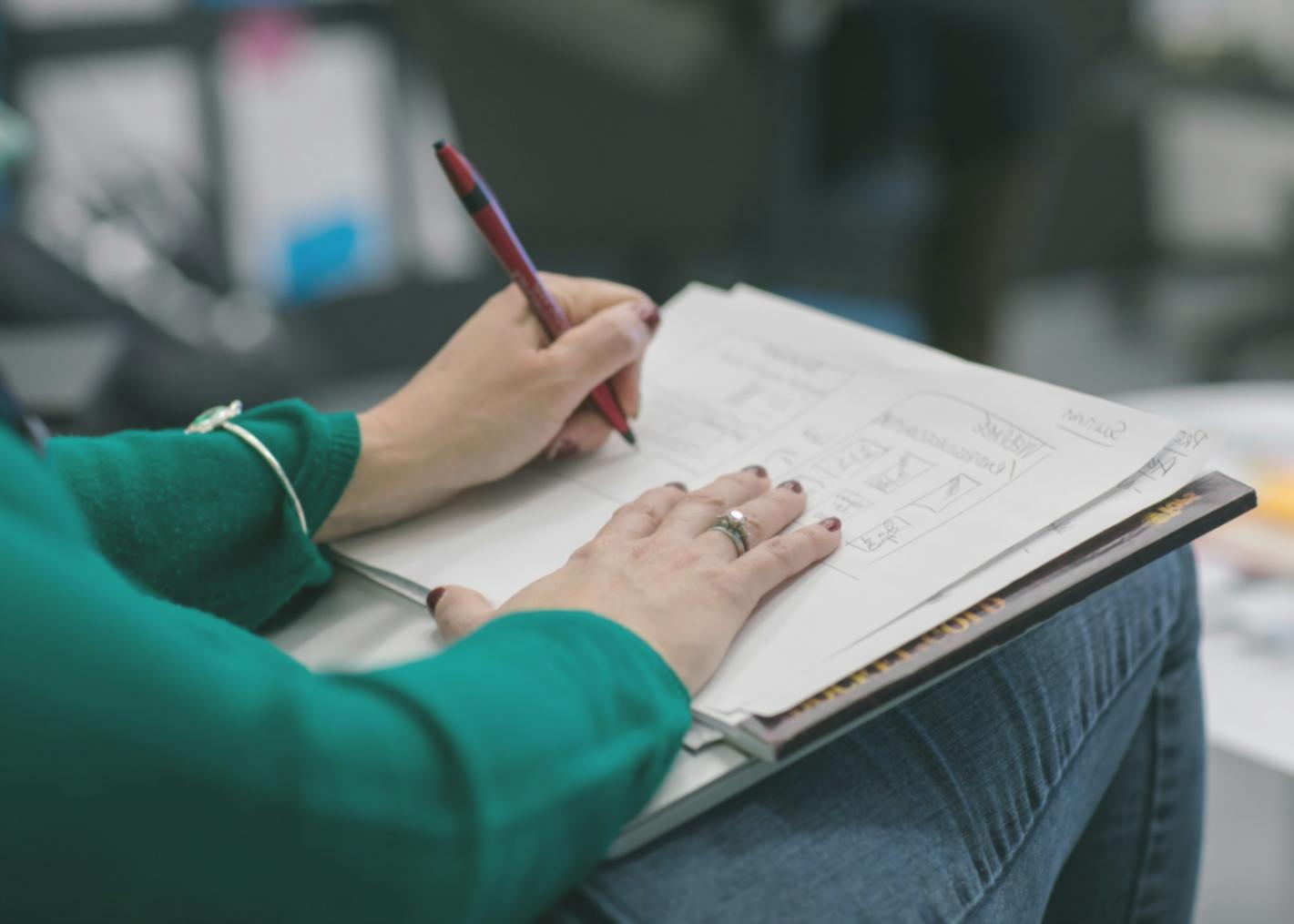 Video editing workspace with multiple monitors showing timeline and effects panels