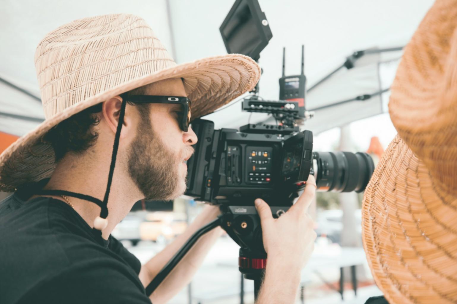 Video editing workspace showing professional editing software interface with multiple timeline tracks and color grading panels