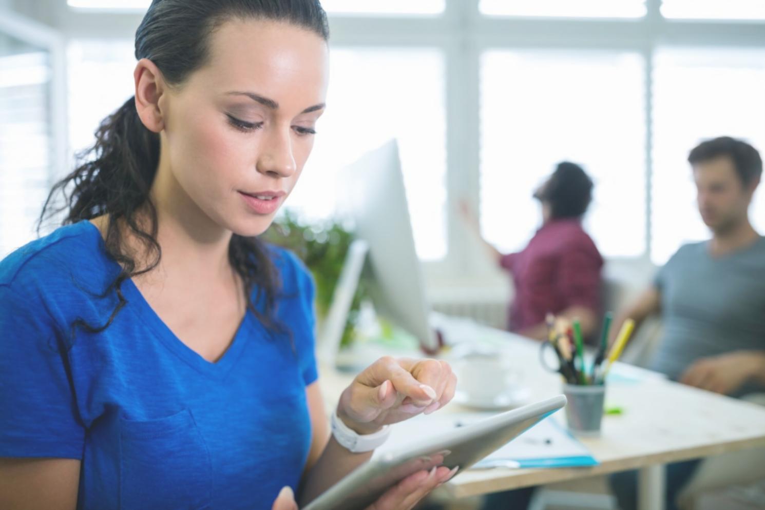 Creative workspace with editing equipment and project materials